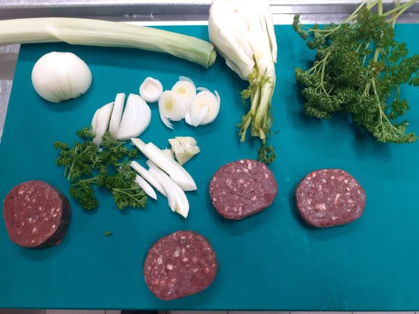 Boudin Tranché - Vins Rouges Harmonieux pour Chaque Occasion